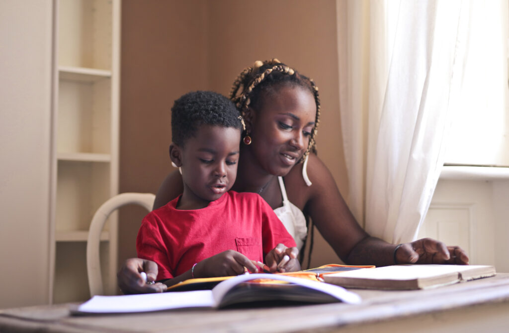 Home Mom Helps Her Son School Homework 1024x669